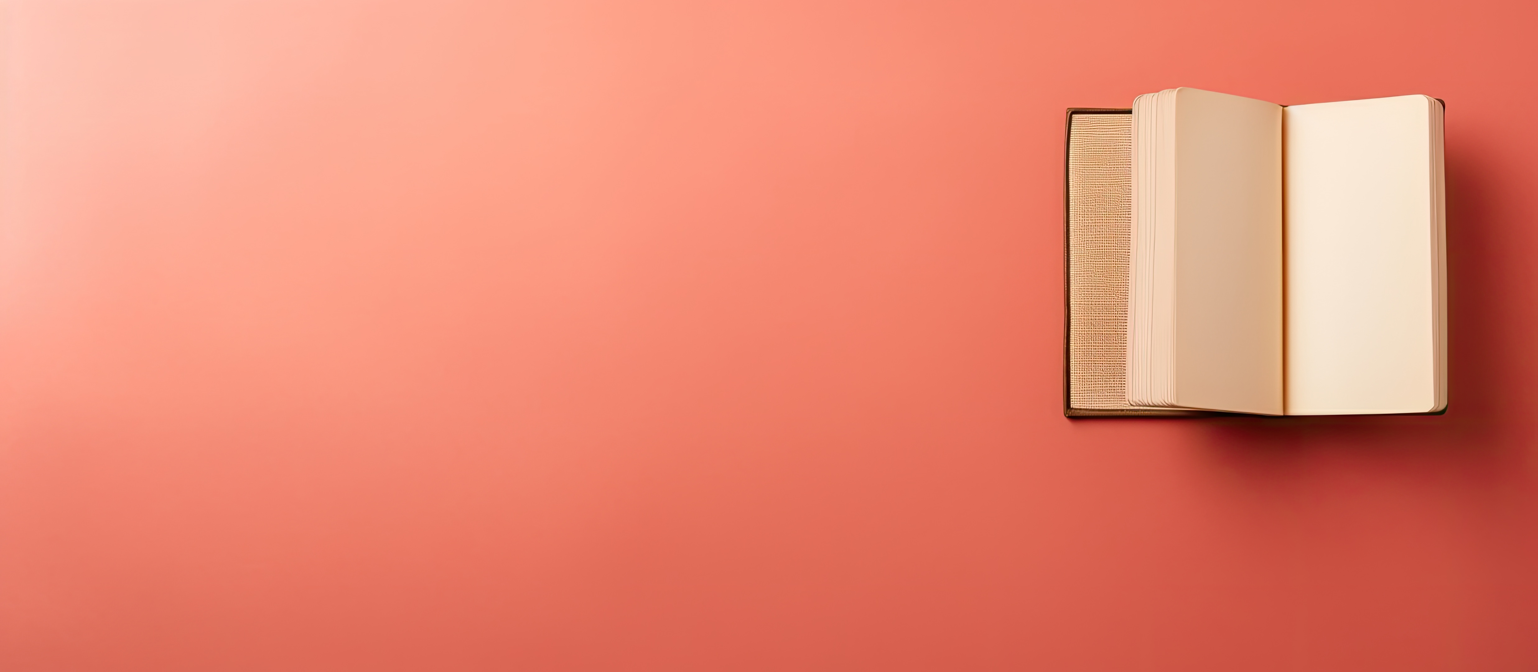 vecteezy photo of a closed red book against a vibrant red wall 26858518